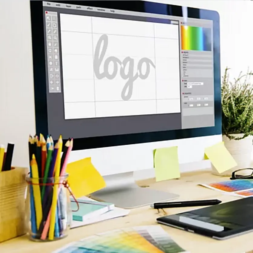 Image of someone designing a logo on a computer